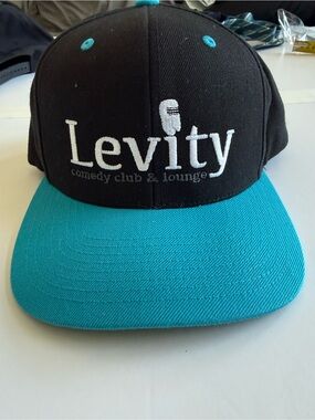The Classic Black and Teal Cap